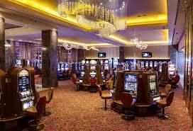 Online gaming platform showing game lobby categories and live casino interface on a tablet